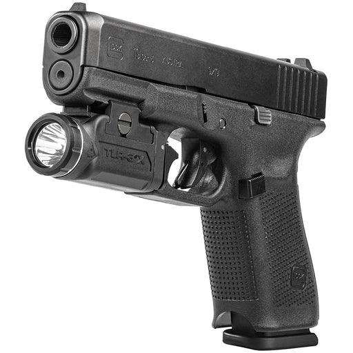 A frontal angled view shows the Streamlight TLR-3 X Gun Light securely mounted to a Glock 19, with both the light and the pistol featuring matching colors for a clean tactical look.