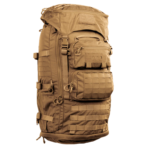 A frontal, angled view of the Mission Ruck Backpack in the coyote brown colorway, highlighting the durable front access panel and tactical webbing.