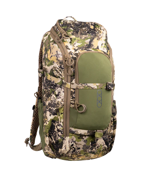A frontal right-angled view of the Eberlestock Brute Scout 30L Hunting Pack in Mountain camo, showcasing the expandable front stretch pocket and the specialized air-mesh shoulder harness designed for superior ergonomics and weight distribution.