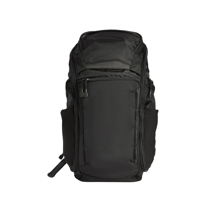 A frontal view of the Vertx Gamut 32L, showcasing its clean lines, rapid access pull tab, and discreet front flap that conceals tactical gear .