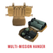 The Haley Strategic X Chest Rig in the color variant coyote and with a multi-mission hanger attachment that has a binocular and an admin panel inside it