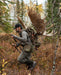 A backcountry hunter utilizing the Brute 4500 Load Hauling Pack to carry a heavy moose harvest, demonstrating how the superior ergonomics and internal frame distribute extreme weight across the hips for stable movement.