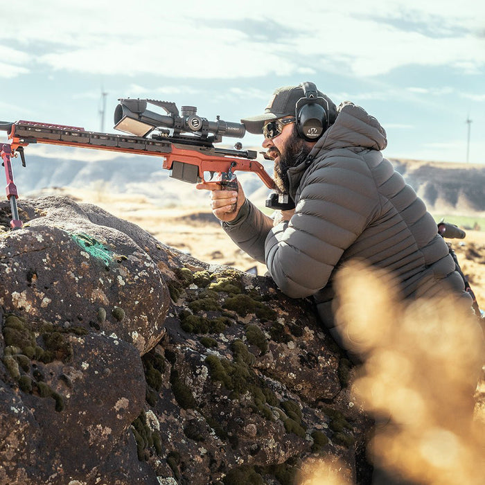 hunter-wearing-gunmetal-eberlestock-mccall-hooded-down-jacket