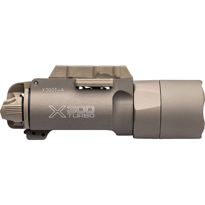 A clear left-side profile of the tan SureFire X300T-A, showing the quick-detach Rail-Lock lever and the high-candela turbo bezel.