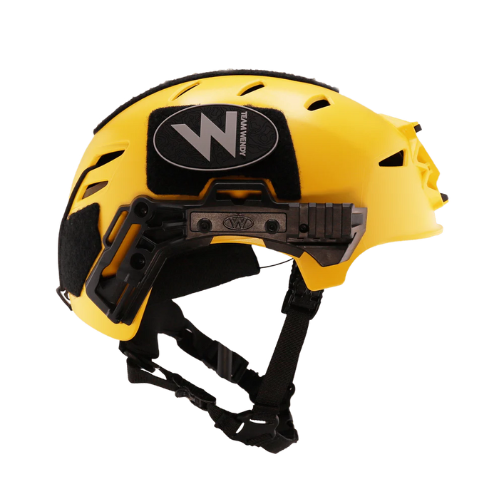 Left-side view of the yellow Team Wendy EXFIL Maritime RESCUER helmet, featuring the Rail 3.0 accessory system in the foreground