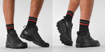 A horizontal lifestyle image of a model wearing the black salomon forces speed assault 2, demonstrating the lightweight tactical design and agility required for operational use.