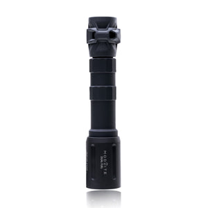 an image of the product where the item is a vertically placed, matte black Modlite FUEL PLHv3 18650 flashlight body, standing on its top part against a seamless pure white background. It features a gascap and hexagon pattern and contours of the textured body are clearly visible, and with the bezel head features the vertically engraved white text 'modlite' branded on it.