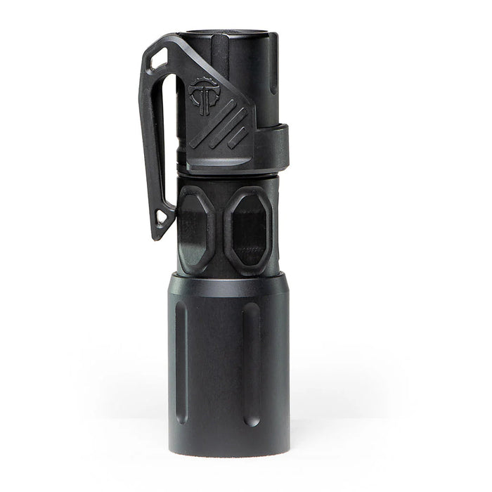 An image of the modlite multi-mode handheld plhv3 18350 flashlight showcasing the black tactical flashlight in the middle of the photo and with a textured grip and white product lettering detailing its dual fuel, multi-mode capabilities on a reflective surface and with the thyrm low profile clip attached to it.