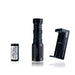 an image of the modlite plhv3 18350 rifle light package in the color black showcasing the complete package option which includes the flashlight body, light head, tailcap, charger and the 18650 battery, and the image shows three items where the black flashlight is in the middle, the charger on its left and the battery on its right.