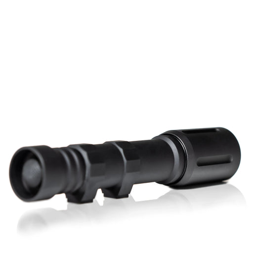 An image of the modlite plhv3 18650 rifle light with the rifle attachments placed on the flashlight body and showcasing the black tactical flashlight  in its back isometric view on the middle of the photo and with a textured grip and hexagon shaped design.