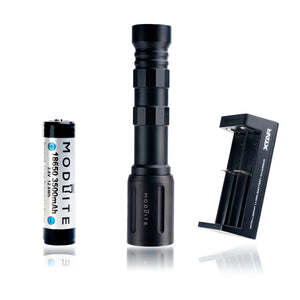 an image of the modlite plhv3 rifle light package in the color black showcasing the complete package option which includes the flashlight body, light head, tailcap, charger and the 18650 battery, and the image shows three items where the black flashlight is in the middle, the charger on its left and the battery on its right.