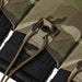 A detailed close-up of the MultiCam magazine pouch designed for low-profile carriage, showcasing the optional passthroughs built into the fabric tab that allow operators to route a double shock cord for customizable magazine retention.