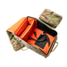 An open Multicam V2 OG Tactical Helmet Bag w/ Nods Box, revealing a bright orange interior equipped with a padded center divider and retention straps, sitting next to its matching smaller night vision storage pouch.