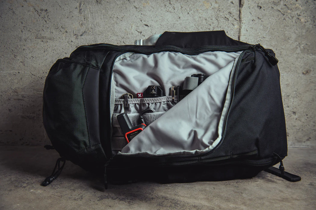 An open view of the second compartment on the Gamut 32L Backpack, revealing the organized storage layout designed to keep gear and accessories secure.