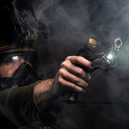 operative one-hand holding pistol mounted with the surefire xvl2-irc