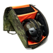 A partially open helmet bag military style in a lush Multicam Tropic pattern, displaying a black tactical bump helmet resting securely inside the vibrant orange padded compartment alongside a stored flashlight.