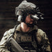 police officer wearing black mid/full cut hellbender te helmet with mounted nvg