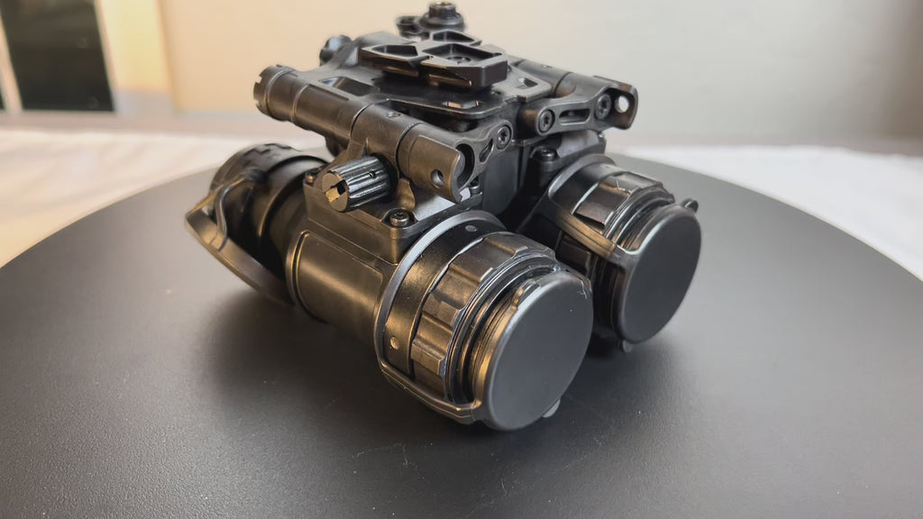 A 240-degree angle view video showcases the elbit f5032 night vision binoculars by Atomic Defense, illustrating the articulating pods and rugged thermoplastic design used in demanding military operations.
