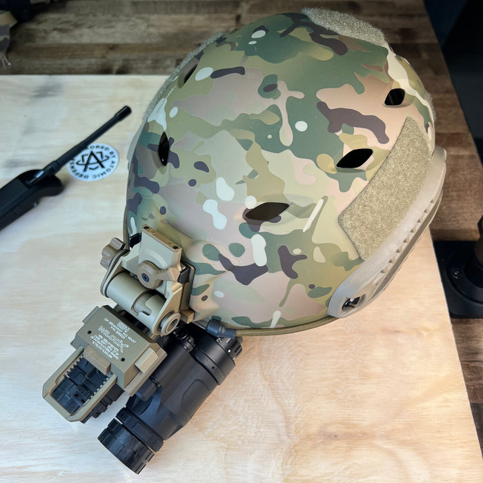 A profile view shows the katana nvg mounted to a lightweight Team Wendy bump helmet using a Wilcox G24 breakaway mount, illustrating a complete headborne setup for low-light operations.