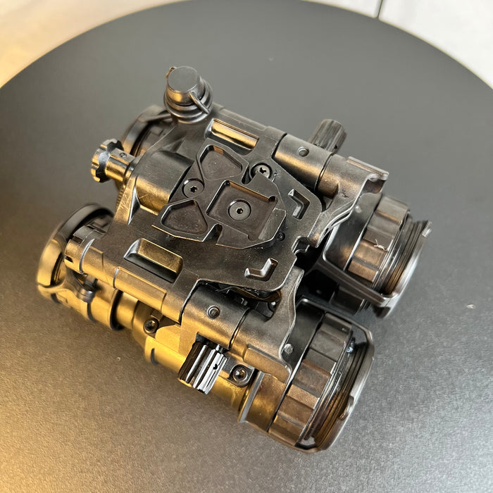 This side top view shows the high-quality dovetail mount on the night vision goggles, ensuring that this authentic pvs 31 for sale attaches securely and precisely to standard helmet shrouds for tactical operations.