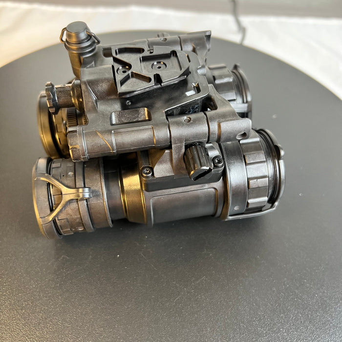 A right-side view of the pvs-31d night vision device shows the rugged articulating pods a