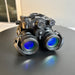 A clear frontal view of the pvs31d night vision binocular highlighting the Gen 3 white phosphor thin-filmed objective lenses and the integrated infrared illuminator used for visibility in absolute darkness.