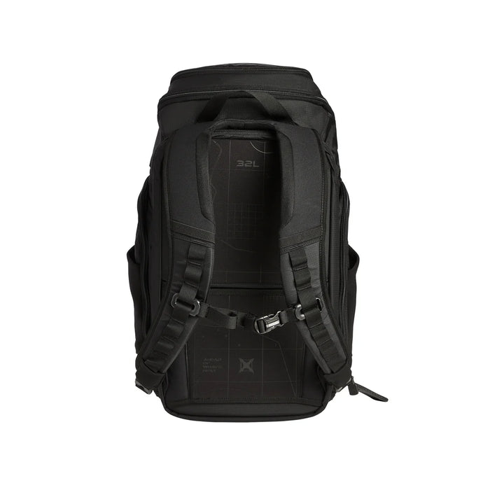 A rear view of the black Gamut 32L Pack, highlighting the adjustable sternum strap and padded shoulder straps that ensure a comfortable fit for the wearer.