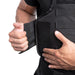 A side-angle close-up of the safe life defense tactical carrier showing the reinforced 6-point adjustment strap and heavy-duty buckle, designed for a locked-in fit that prevents the vest from shifting during high-intensity movement.