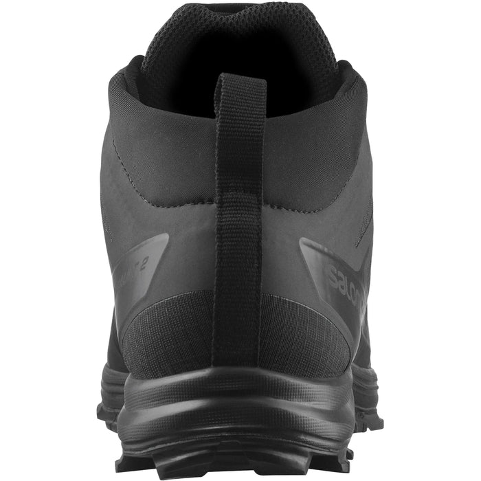 A detailed rear perspective of the black salomon assault speed 2, focusing on the robust heel pull-tab in the foreground that allows for immediate readiness in tactical situations.