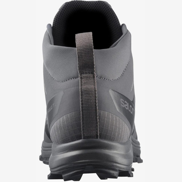 A close-up rear view of the Wolf Grey salomon shoes tactical, focusing on the sturdy bootstrap in the foreground that ensures quick and easy entry for operators.