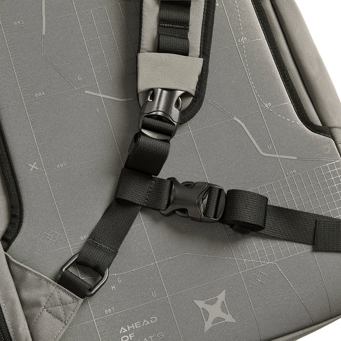 A close-up detail of the shoulder strap connection point on the Gamut 22L Sling Pack, showing the reinforced stitching and hardware that secure the single-strap carry system.