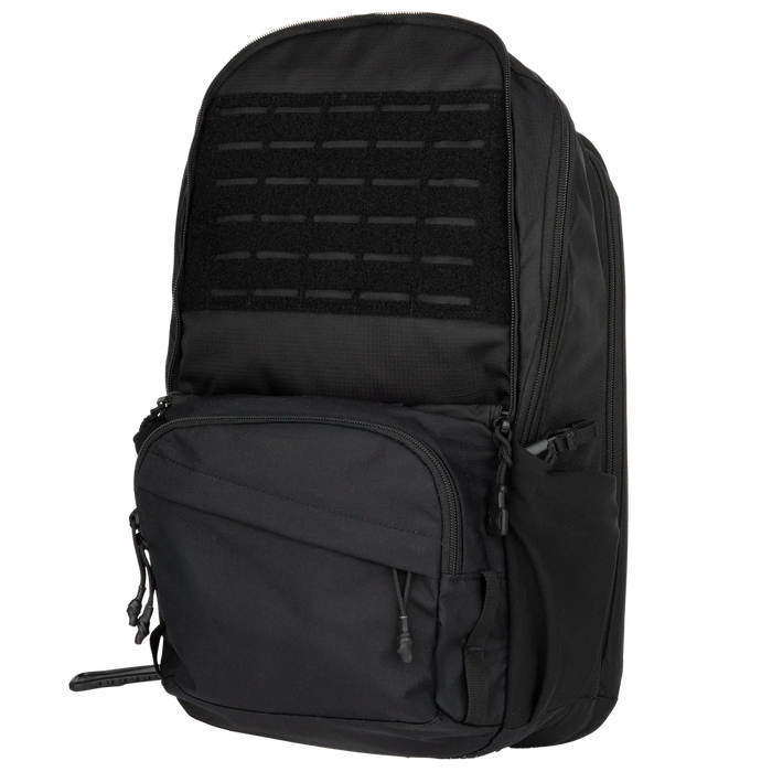 A side angled view of the front section of the Ready Pack X 20L Vertx, where the stowable front flap has been tucked away to reveal a laser-cut MOLLE panel for additional gear attachment and customization.