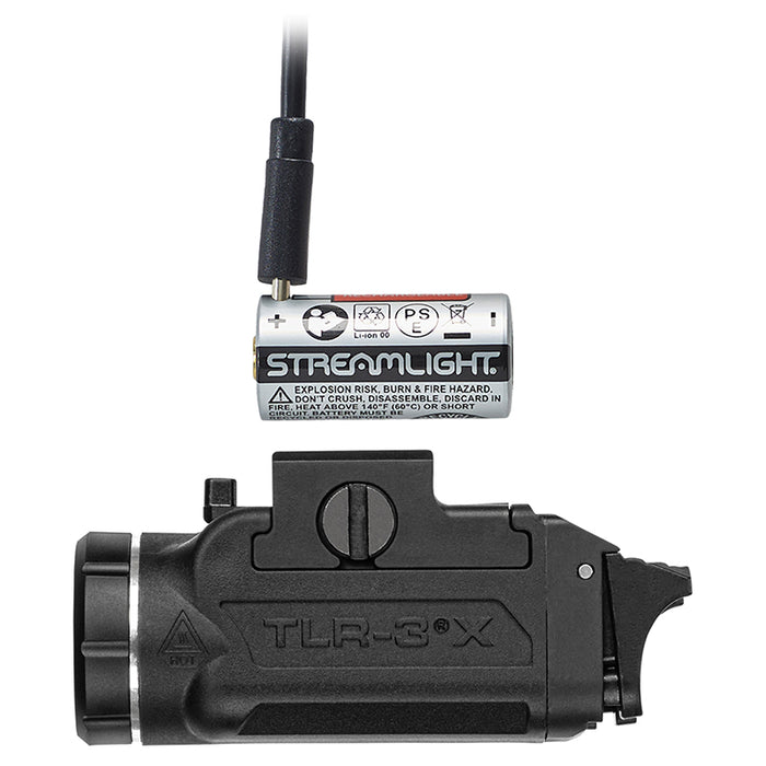 A side profile shot showing the Streamlight TLR-3X weapon light with the SL-B9 rechargeable battery removed and connected to a USB cable for charging.