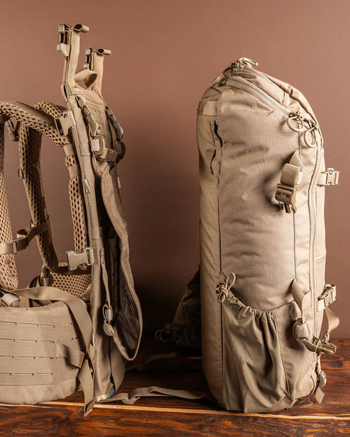 A side view of the Eberlestock 3500 Hunting Pack showing the removable internal frame as it integrates with the contour shoulder straps to create a stabilized, ergonomic carrying system.