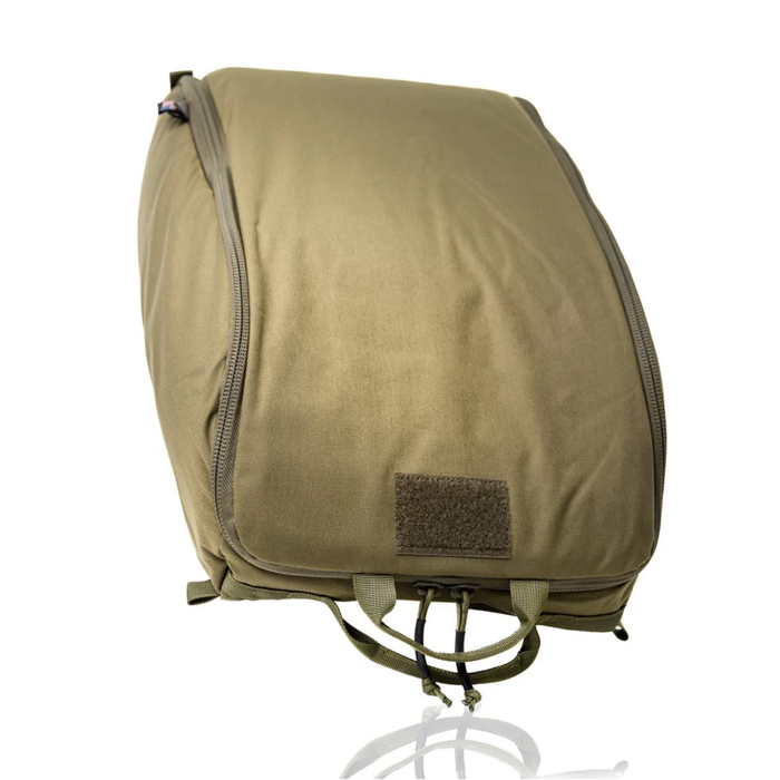 A rugged, solid olive green padded bag for helmet protection, shown fully zipped up with a blank velcro loop patch on the lower front and sturdy bottom grab handles.