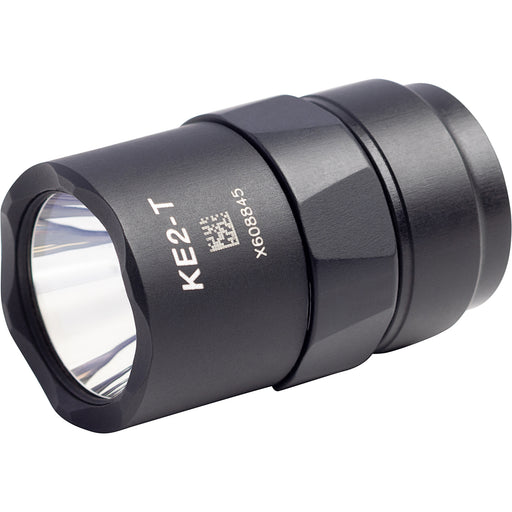 An isometric view of the SureFire KE2-T in black, showing its rugged aluminum construction and compact design