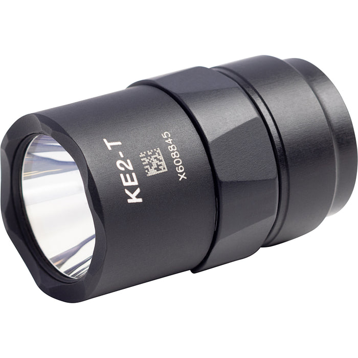 An isometric view of the SureFire KE2-T in black, showing its rugged aluminum construction and compact design