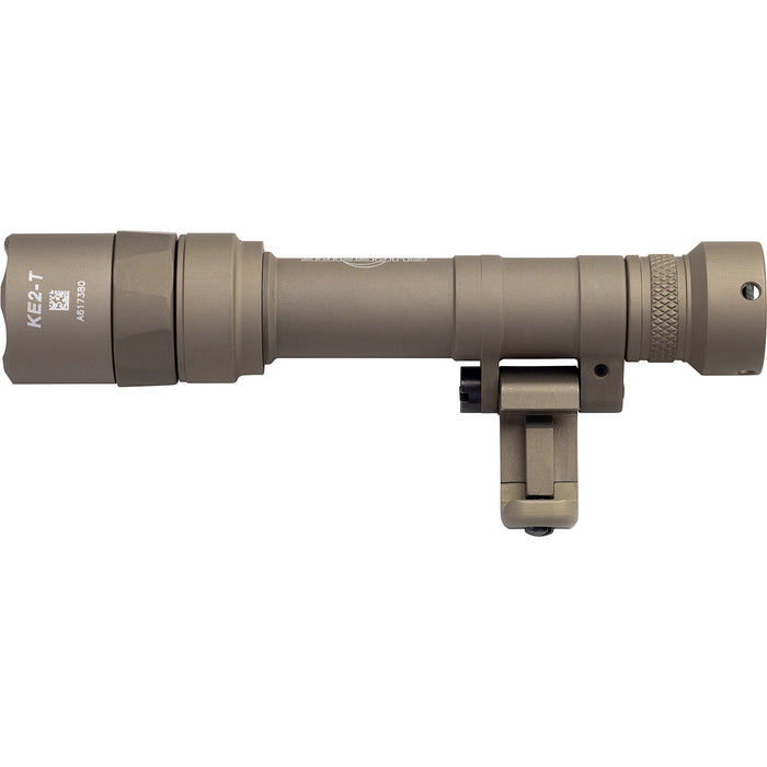 A detailed left-side profile view of the desert tan SureFire M640T Turbo Scout Light Pro, highlighting its elongated Turbo head and integrated pivoting mount for seamless rail attachment.