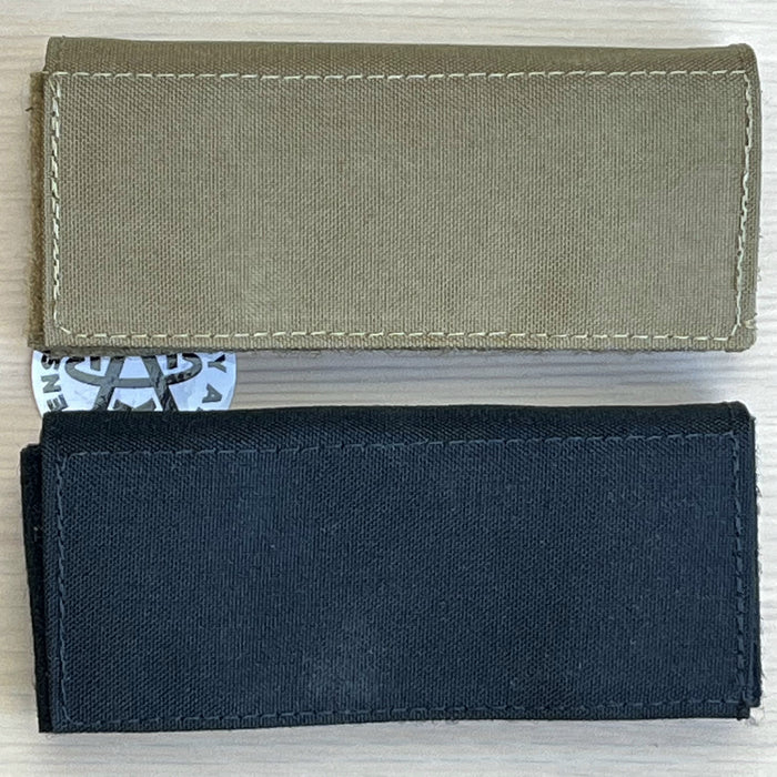 A side-by-side comparison of the large-size team wendy exfil counterweight kit in both Black and Ranger Green, showcasing the three 0.5 lb weights and the durable nylon pouches used for maximum helmet stabilization.