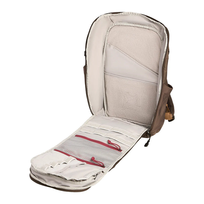 The main compartment of the Vertx Gamut 26L Grey Man Pack opened to display its spacious interior, featuring a Velcro wall for tactical add-ons and various admin pouches.