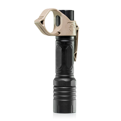 An image of the thyrm switchback 2.0 pocket clip in the color tan is attached to a black modlite handheld 18650 flashlight, where the product is situated in the middle and is standing on the flashlight's light head.