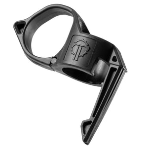 an image of the thyrm switchback 2.0 pocket clip in the color black where the item itself is situated int he middle of the image and is tilted to the left; there is a thyrm logo branded in the middle of the item and on its right is the clip's ringer ring and on the left which is the longer part of the item is the pocket clip feature of the accessory.
