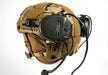 A rear view of an M-LOK bump helmet showing how the unity mark allows Liberator II ear cups to be pulled away from the ears and rotated backward for snag-free stowage at the rear of the helmet shell.