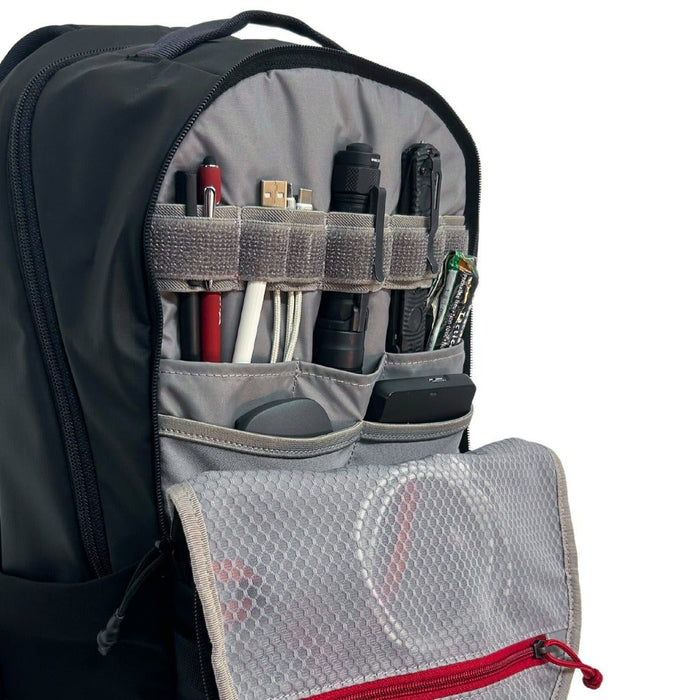urban ghost 20l backpack organization pockets and hold down straps