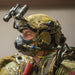 U.S. Army photo by Spc. Christopher Stevenson showing an operator wearing an Ops-Core FAST SF helmet with Night Vision Goggles and a HEL-STAR Lead Jumper Light.