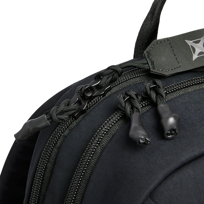 A detailed close-up shot of the rugged Vertx Any Day Pack showing the smooth-gliding YKK zippers on the main and CCW compartments, with the oversized rapid access pull tab positioned on the right for a fast, intuitive draw.