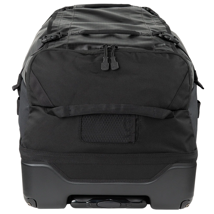 A top-down view of the Vertx RLT 100L Duffel Bag Roller clearly displays the reinforced carry handle, the translucent mono-honey mesh ID slot, and the aluminum retractable handle positioned in the foreground for easy access.