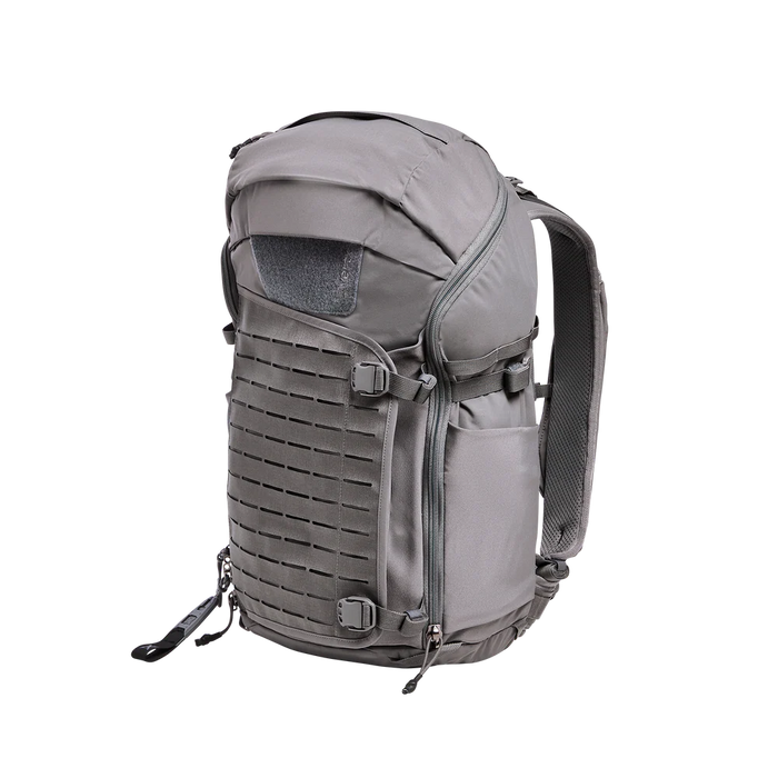 Side-angled view of the Vertx Siege 35L Backpack in Wolf Grey , showing the durable 330D Nylon exterior and side compression capabilities.
