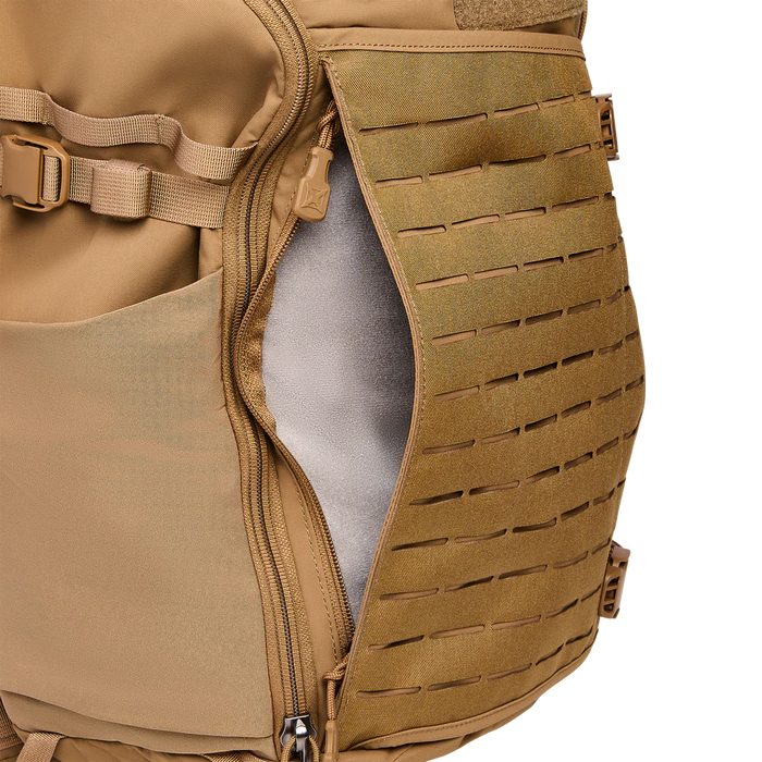 Close-up of the frontal pouch on the Vertx Siege 35L Military Backpack, highlighting the durable 500D MOLLE panel and expandable storage capacity designed for heavy loads.