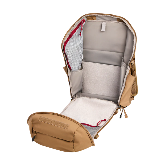 Interior view of the open Vertx Siege 35L main compartment, revealing the massive 35-liter storage capacity designed to hold heavy mission loadouts.